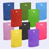 BAGS POLY: Poly Die Cut Handle Gloss Bags. Very Popular Strong and Durable.  Many Colors and Sizes to Fit Your Needs. Great Price! Less than .06 ea. to .19 ea.