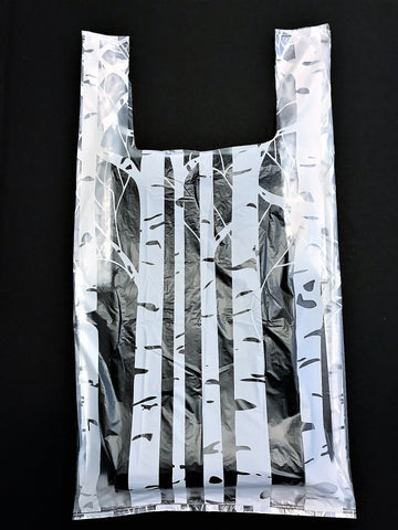 BAGS POLY: Aspen Collection. Plastic Designer Aspen Degradable Environmental Collection: Plastic T-Shirt Style Aspen Forest Bag. Clear Film Printed with White Aspen Forest. Popular Size, NOTE: Heavier Film 1.0 mil. :  12 x 7 x 23 / 500 cs.  .19