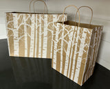 Bags Paper Print:  Designer Aspen / White River Birch Collection.   Natural Recycled Kraft Shoppers. Offered in Two Popular Sizes 8 x 4.75 x 10.25 and 16 x 6 x 12.